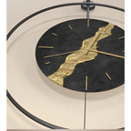 Musta-kultainen kintsugi-heiluriseinäkello